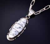 Silver and White Buffalo Turquoise Inlay Oval Pendant by Steve Francisco 5L17M