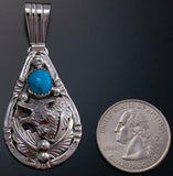 Silver Turquoise Howling Wolf Pendant by Henry Attakai ZK05C